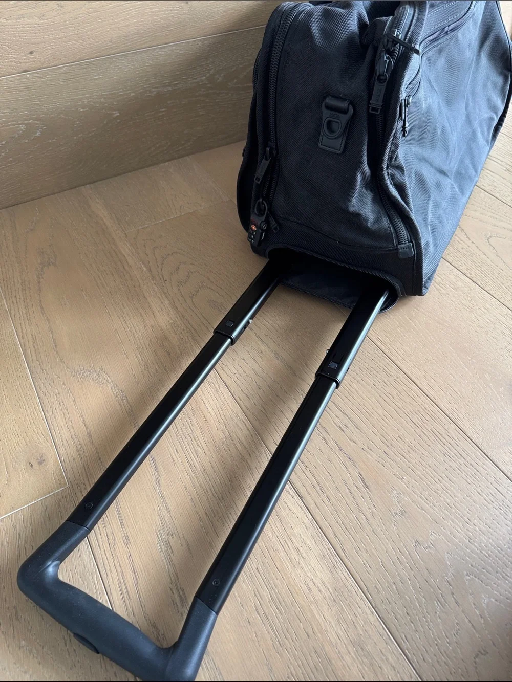 Tumi Black Nylon Duffel Travel Bag with wheels and handle